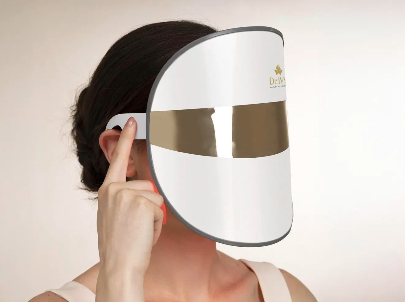 Woman wearing a Dr Ivy Skincare London Regenerative skincare Energy LED Face mask