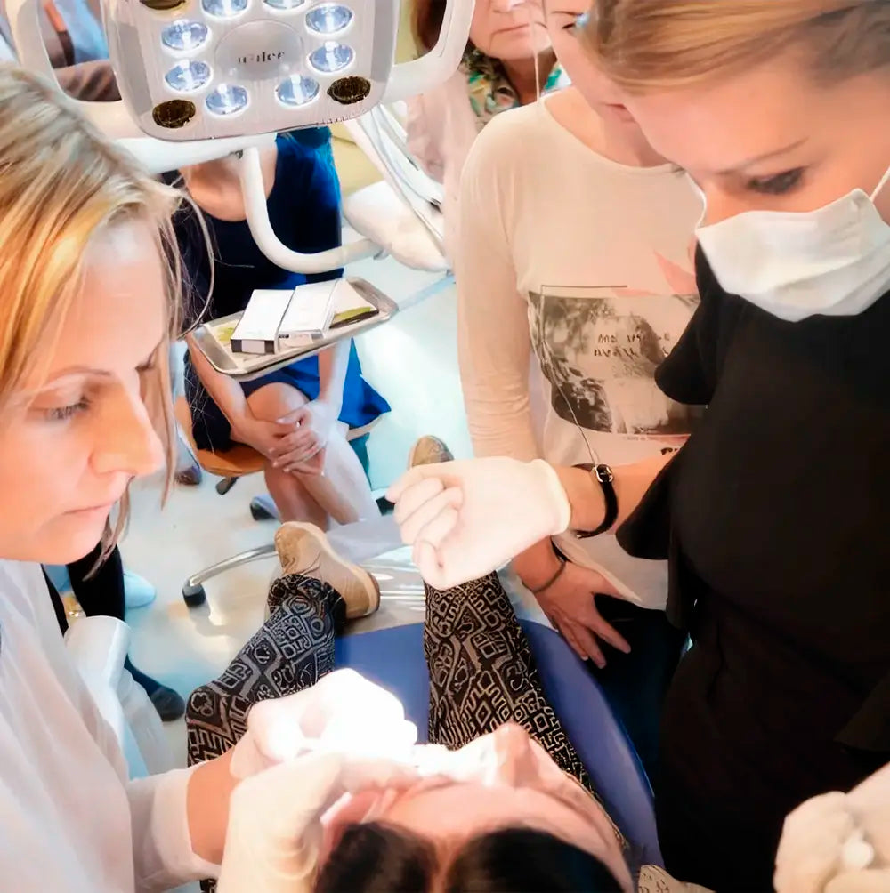 Portrait of Dr Ivona Igerc (Dr. Ivy) London performing a treatment