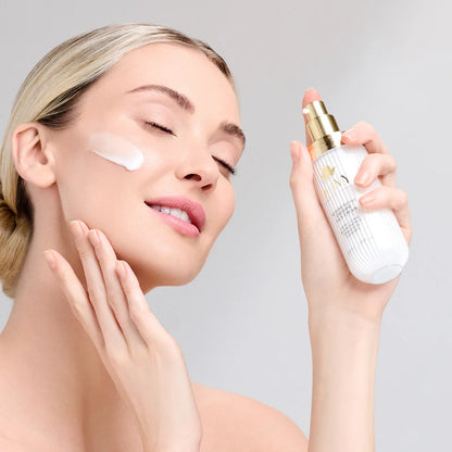 model applying Dr Ivy Skincare London Exosome Regenerative skincare products bio-hacking cream